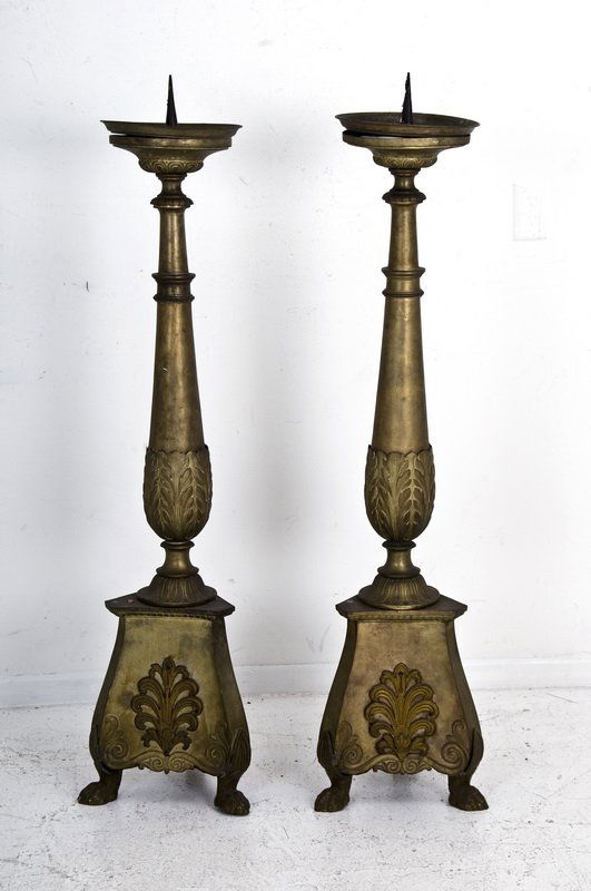 PAIR OF CONTINENTAL GILT METAL ALTAR STICKS: each classical-form stem on a tripod base Provenance: JF Chen, Los Angeles 53 inches high