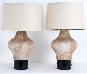 PAIR OF HAINES ETRUSCAN STYLE POTTERY TABLE LAMPS: each with a cylindrical black painted base Provenance: The Estate of Dr. Herbert & Mrs. Rita LeRoy Roedling, a William "Billy" Haines commission 29 total inches high