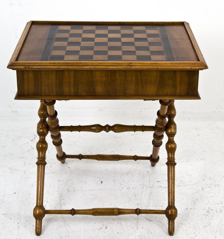 CHESS BOX ON STAND: each face of the lid with chess board inlay opening to two inlaid backgammon compartments, the case having a narrow drawer on each short face, supported on a collapsible baluster stand 29 1/4 inches w