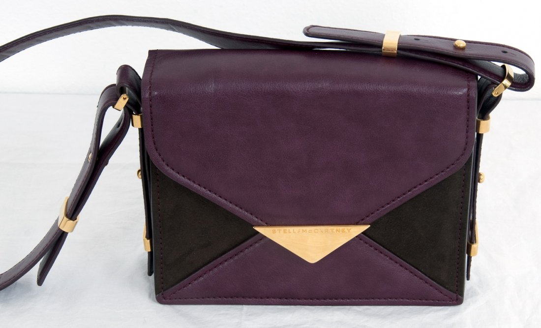 STELLA MCCARTNEY "VACHETTA" HANGBAG: Burgundy and brown leather handbag, fold-over front flap, goldtone hardware; authenticity card and outer cloth bag 9 inches wide; 2 inches deep; 7 inches high