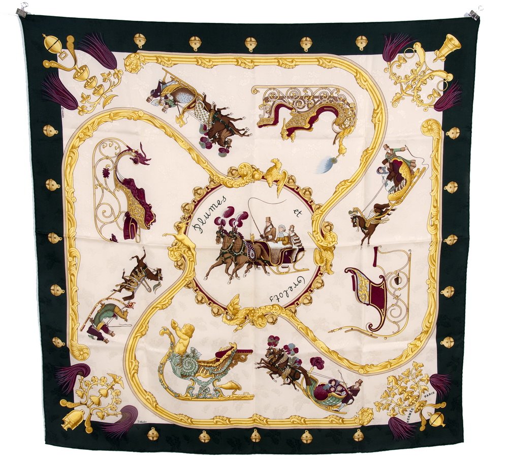 HERMES SILK SCARF "PLUMES ET GRELOTS": Designed by Julia Abadie; depicting various styles of sleighs; dark green border; jacquard silk 35 inches x 35 inches