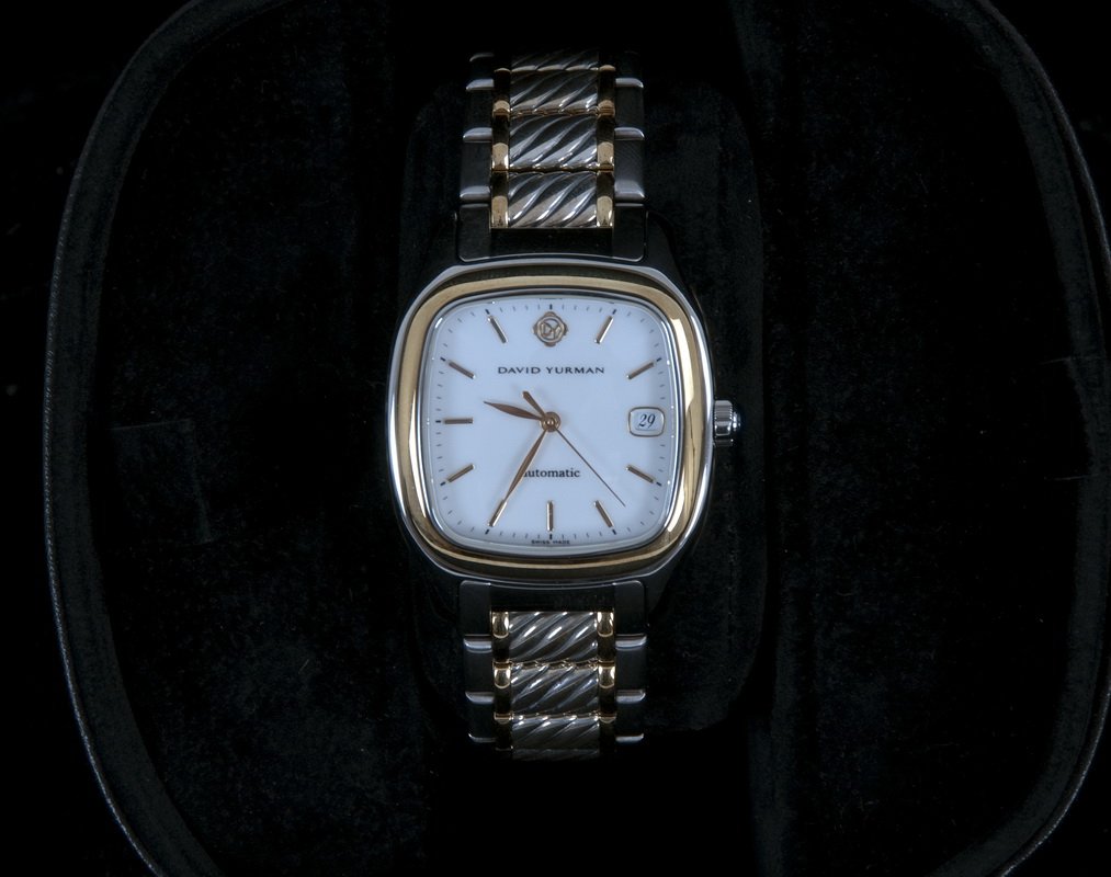 DAVID YURMAN THOROUGHBRED GENTLEMAN'S WATCH: 18K yellow gold, sterling silver, and stainless steel watch; pillow shaped with white dial; date function; automatic; sapphire crystal; exhibition caseback; box