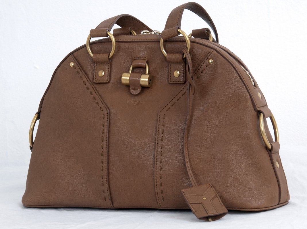 YVES SAINT LAURENT MINI "MUSE" TOTE: Pleine Fleur Aniline style; sturdy lightly textured brown leather with brown stitching; logo on lock and key; authenticity card 14 inches wide; 9 inches high