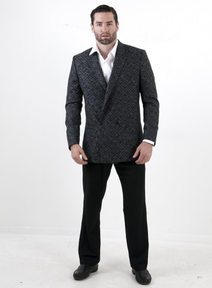 VERSACE CHECKERED GRAY WOOL JACKET: Gray and black checkered wool Tailor Made sports coat; black signature buttons Provenance: The Estate of David Copley, La Jolla Size: 56