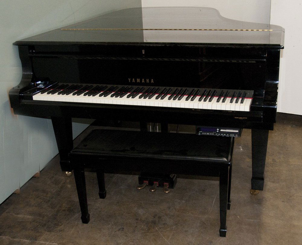 YAMAHA EBONY CASE GRAND PIANO: with bench; circa 1995-96, model "C7", serial number 5436955 7'6"