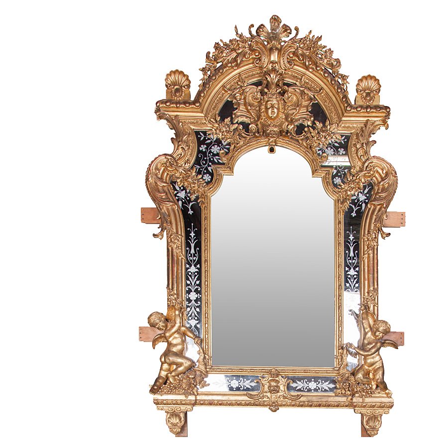 FRENCH RENAISSANCE STYLE GILTWOOD HALL MIRROR: the arched plate surmounted by a floral and masque cornice and having a mirrored border and a gilt, acanthus carved frame with a cherub at either bottom corner 88 x 54 inches