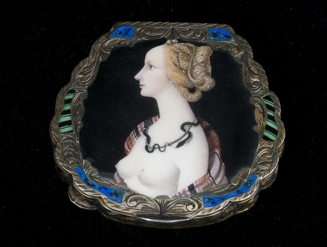 GILT SILVER AND ENAMEL COMPACT: the scalloped lid with an enameled portrait of a nude in profile opening to a powder compact 3 1/4 x 3 1/4 inches