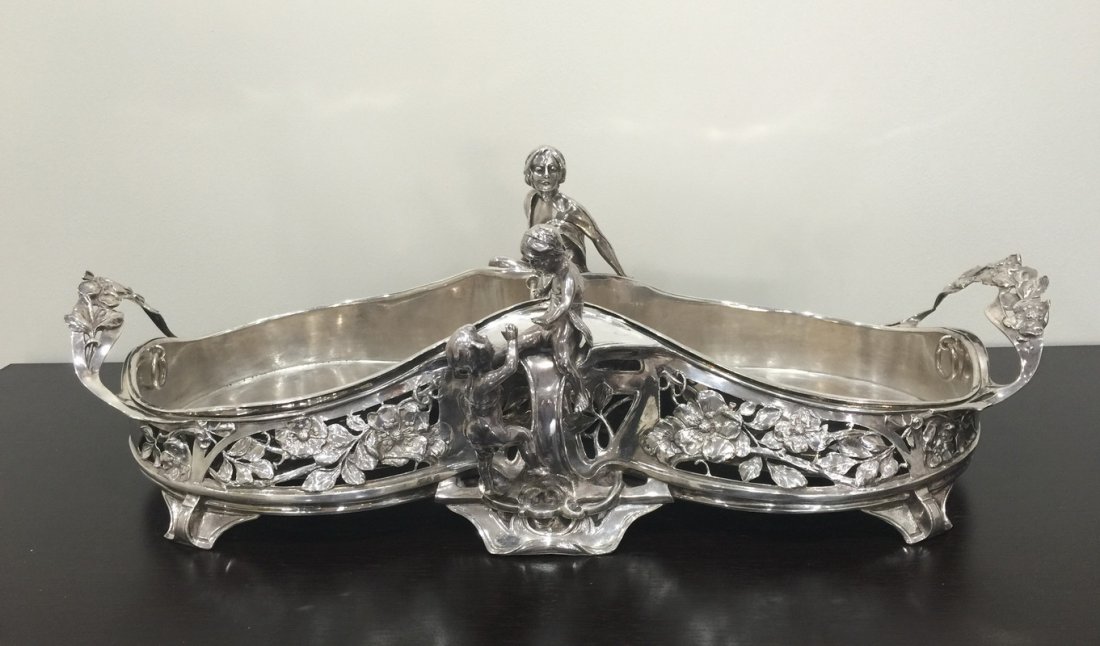 AUSTRIAN ART NOUVEAU SILVER FIGURAL CENTERPIECE: circa 1890 Bruckmann & Sohne; fully hallmarked with two detachable metal liners; 68 ounces 22 inches long; 10 inches deep; 7 3/4 inches high
