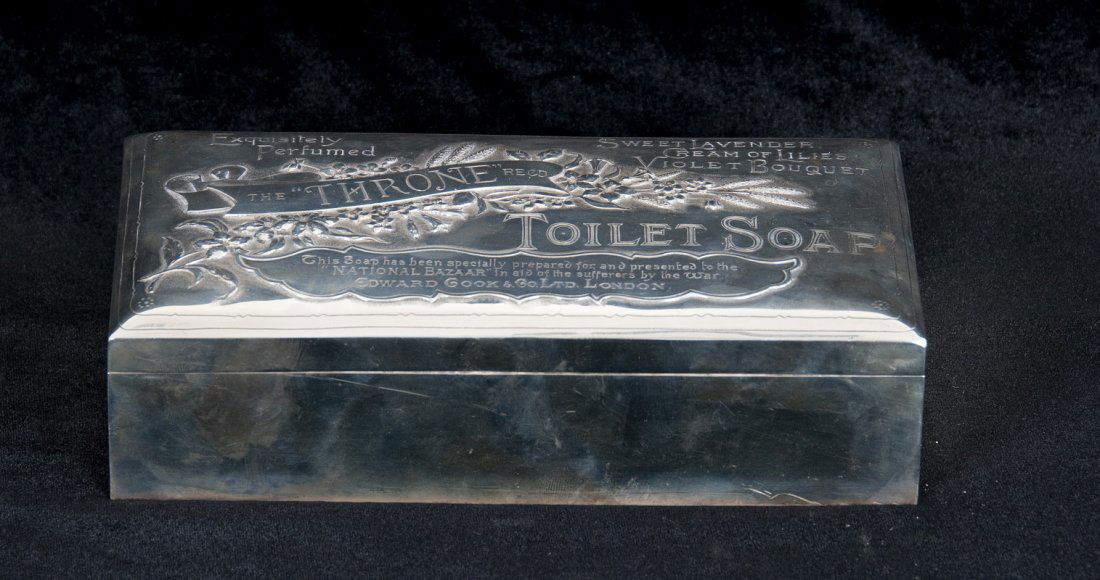 VICTORIAN SILVER PRESENTATION SOAP BOX: Grey & Co, London, 1899-1900 the chased and repousse lid for the "Exquisitely Perfumed The 'Throne' Toilet Soap"; the interior with gilt inscription on silk: "Presented to/ Her Royal Highness The Prin