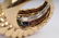 DAVID WEBB: 18 KARAT GOLD & PRECIOUS STONE RING - 3
