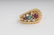 DAVID WEBB: 18 KARAT GOLD & PRECIOUS STONE RING - 6