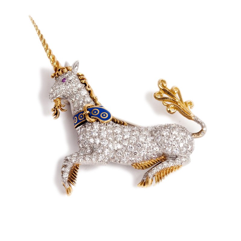 MCTEIGUE: 18 KARAT GOLD, PLATINUM, & DIAMOND UNICORN: with maker's mark "MT" with a blue enamel collar 17.4 grams approximately 1.6 inches long