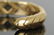 THREE 18 KARAT GOLD, DIAMOND, & COLORED STONE CUFF - 10