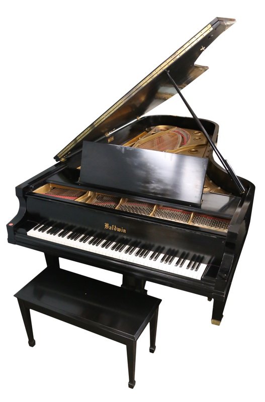 BALDWIN CONCERT EBONY CASE GRAND PIANO: with bench; circa 1960's, model "D," serial number 147312 Provenance: A Las Vegas, Nevada Collection 8'11"