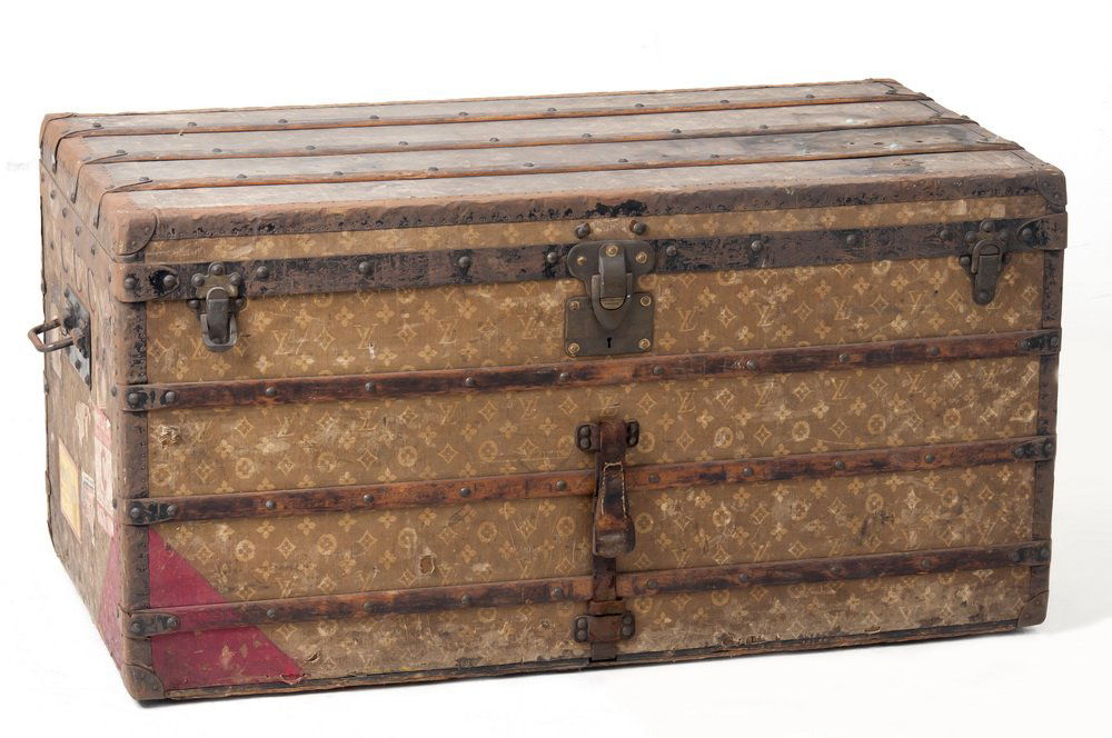 LOUIS VUITTON TRUNK: stamped 159893 with basket and fittings Condition: with loss and wear commensurate with age 43 inches w, 22 inches deep, 22 inches h