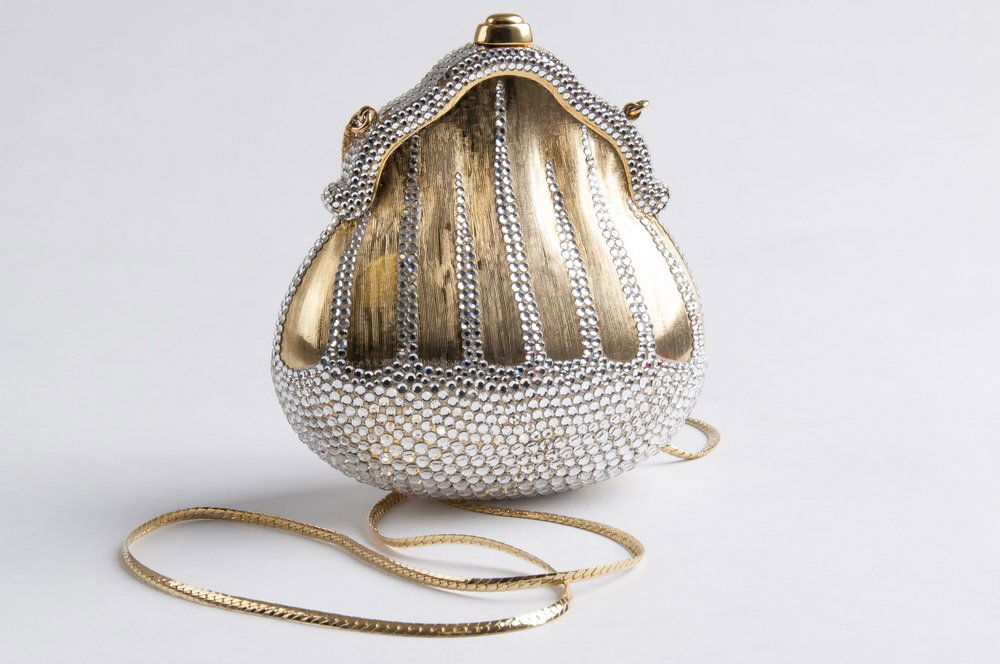 JUDITH LEIBER HALF BEAD CRYSTAL MINAUDIERE: in the shape of a shell, drop in chain 4 3/4 inches width x 5 inches height