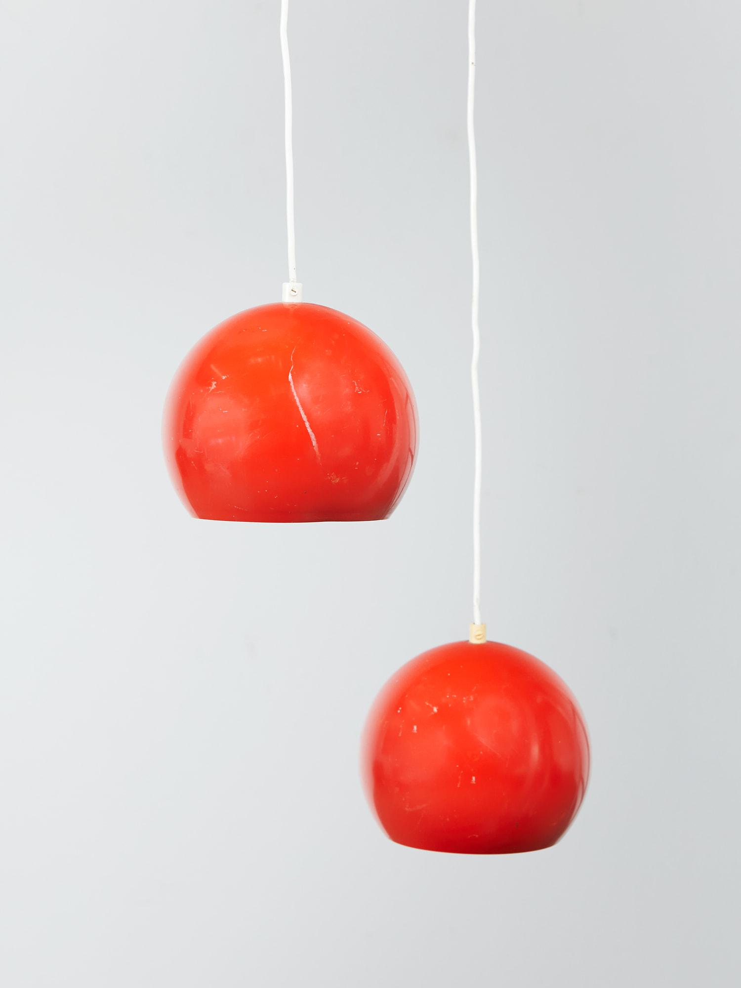 Verner Panton (Denmark, 1926-1988): Verner Panton (Denmark, 1926-1988) A pair of 'Topan VP6' pendant lamps designed in 1960 This was Panton's first mass-produced lamp design.