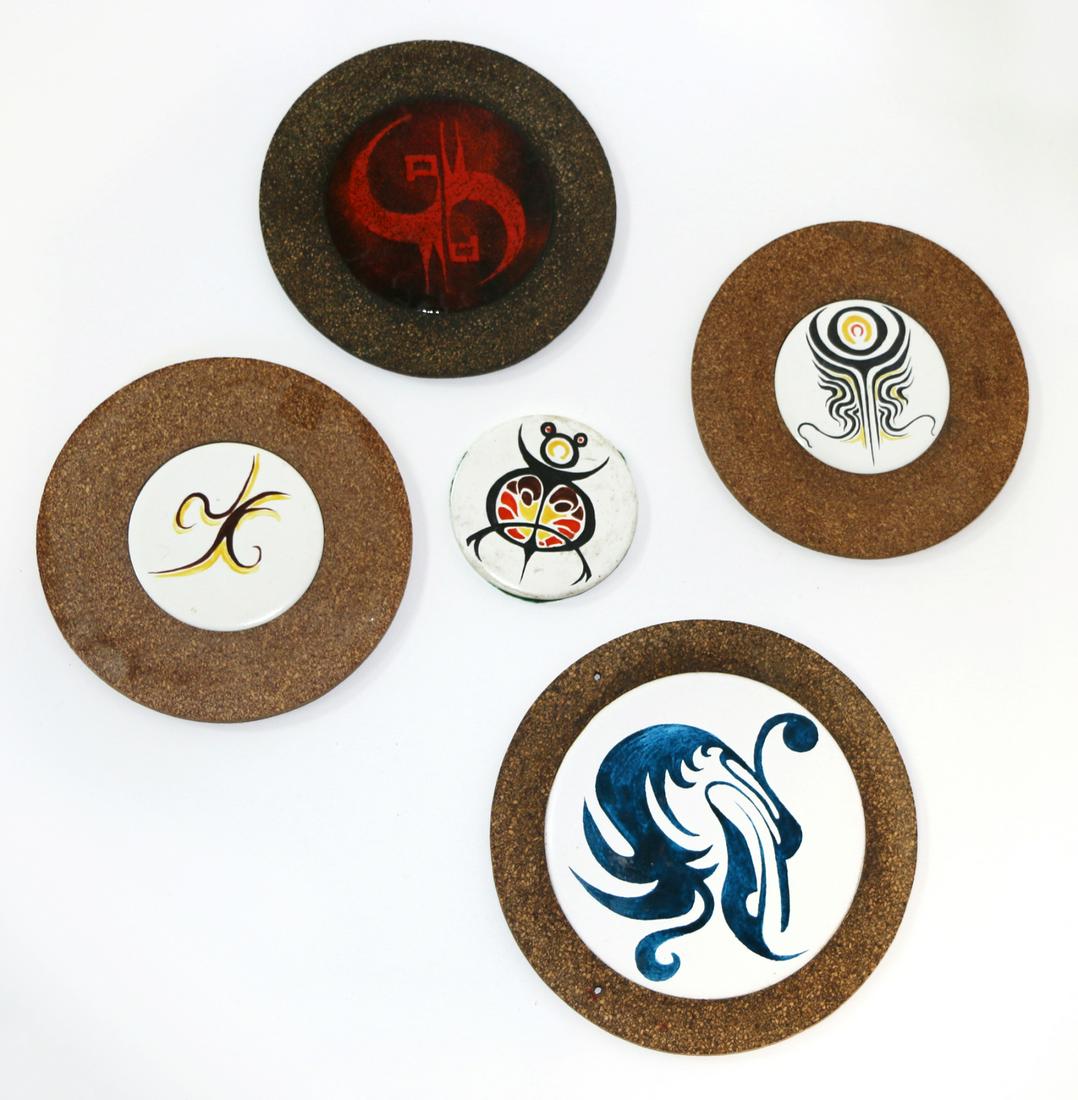 John Crichton: John Crichton Five trivets porcelain, four within a cork dish D. 150mm max Provenance: John Crichton Estate