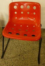 Four Robin Day designed Zip Industry side chairs: With red plastic seats