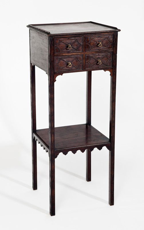 George III period Honduras mahogany washstand: 18th century. The drawer fronts with blind fretwork in the manner of Thomas Chippendale. W.34cm H.83cm D.31cm