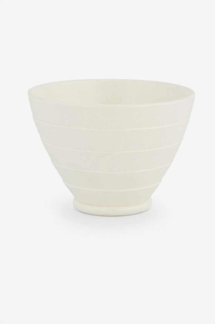 Keith Murray for Wedgwood: Moonstone glazed tapering conical bowl raised on a circular foot, KM factory mark to the base, d.150mm