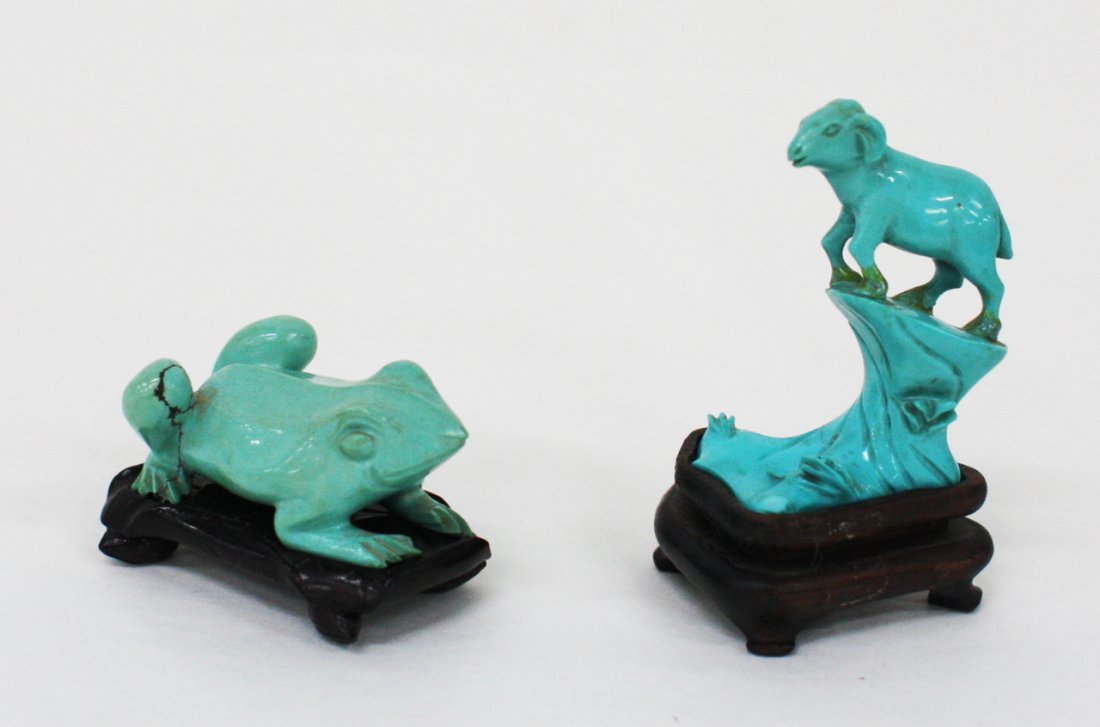 Two Chinese turquoise carvings: The first carved as a frog, the second as a ewe standing on a rock, both with wood stand. The first, L. 45mm Provenance: From the Leo Walker Tattersfield Collection