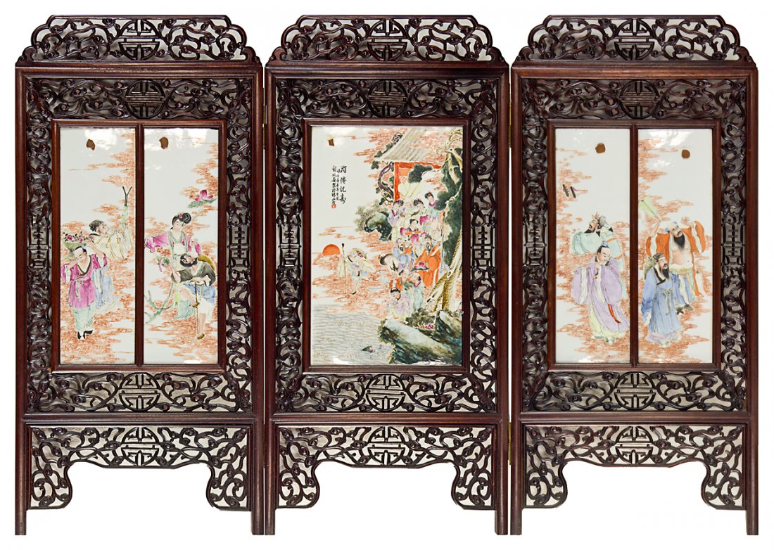 Large Chinese famille rose porcelain screen: Early 20th century formed by three panels, each panel depicting a scene from ‘The Eight Immortals Cross the Sea’ legend. Each porcelain panel: 295 x 470mm; each wood panel: 475 x 1010mm