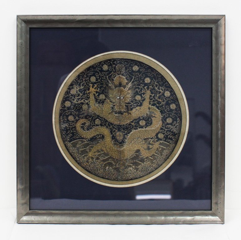 Qing Dynasty Chinese Imperial Rank Badge: with the five-clawed Dragon of Heaven, probably of Qianlong period (1736-1795), silk, couched silver and gold wrapped thread, worn on the front of a formal surcoat. D. 290mm, framed and glazed Provena