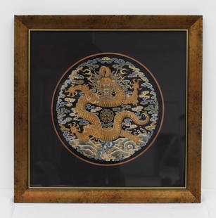 Qing dynasty Chinese Imperial Rank Badge: with the five-clawed Dragon of Heaven, probably of late Qianlong period (1736-1795), silk, couched gold wrap thread and silk thread, worn on the back of a formal surcoat. D. 275mm, framed and glazed P