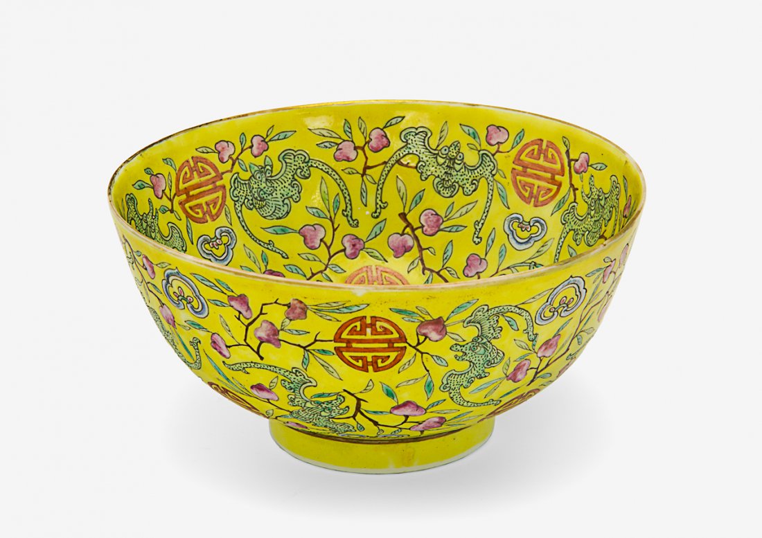 Chinese yellow ground famille rose bowl,: Guangxu underglaze blue six-character mark and of the period (1875-1908), painted with auspicious ‘long life’ decoration with bats, shou characters and peaches. D. 135mm Provenance: Tony Allen’s