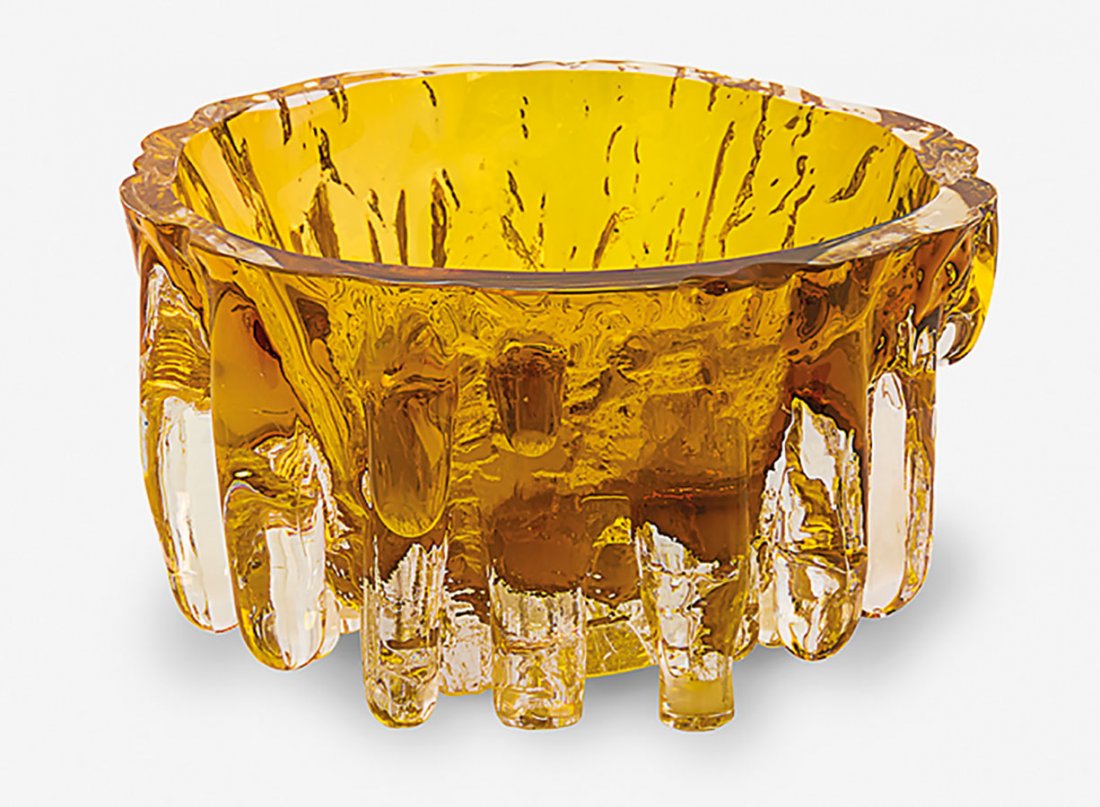 Goran Warff for Kosta in Sweden: An impressive sculptured yellow glass bowl, the thick walled bowl standing on icicle like formations. Circa 1975. Engraved marks to the base Kosta G Warff Unikt . H. 170mm D.150mm