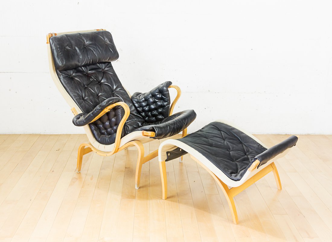 Bruno Mathsson for Dux: Pernilla chair and ottoman, beech frame with black leather upholstery