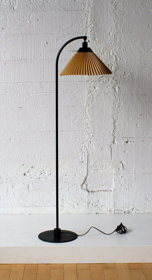 Le Klint: 1950s steel floor lamp, with original shade. H. 1450mm Literature: Mid Century Modern Complete, Dominic Bradbury. P.140.