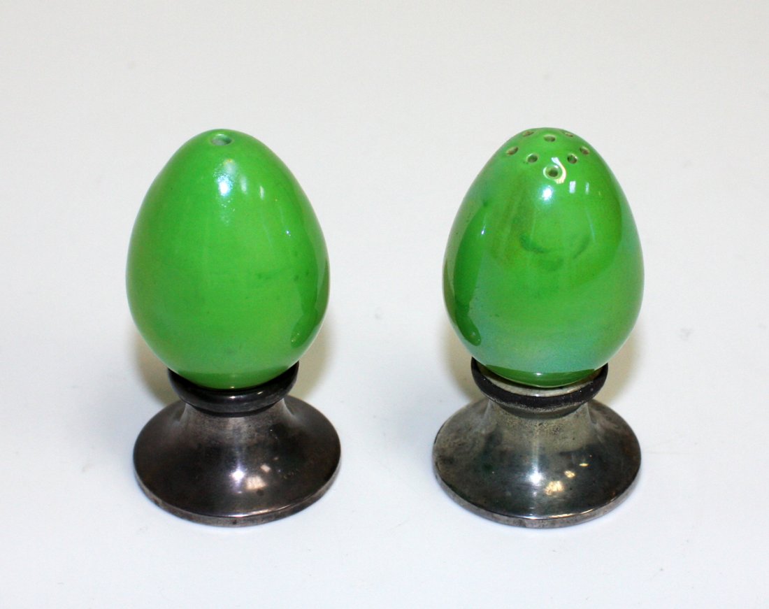 Ruskin green salt and pepper pots: each of ovoid shape on sterling silver bases