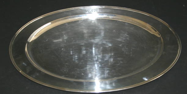 Sterling oval serving platter. Presentation First: Sterling oval serving platter. Presentation First National Bank of Chicago. Monogramed. 20 1/2"L x 14 1/2"D. 153 grams.