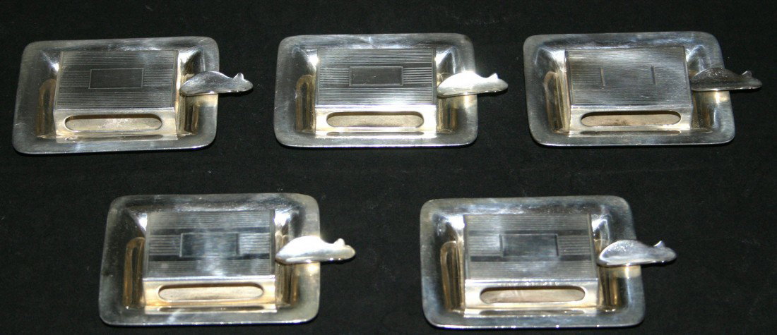 Five (5) complete Black Starr Gorham sterling ash : Five (5) complete Black Starr Gorham sterling ash tray and sterling matchbox holder. One (1) extra sterling ash tray. Marked sterling 2035. Ash trays 2 1/2" x 2 3/4". 28.5 grams.