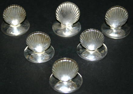 Six (6) Tiffany & Co. sterling shell name card hol: Six (6) Tiffany & Co. sterling shell name card holders. Marked 925. Six (6) Tiffany & Co. bags included. 5 grams.