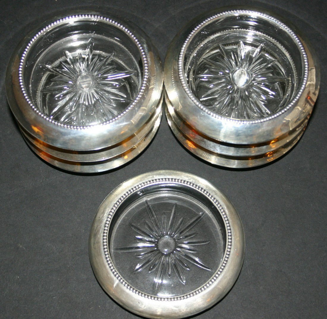 Seven (7) Frank M. Whiting sterling weighted coast: Seven (7) Frank M. Whiting sterling weighted coasters. 4"D. 118.4 grams.