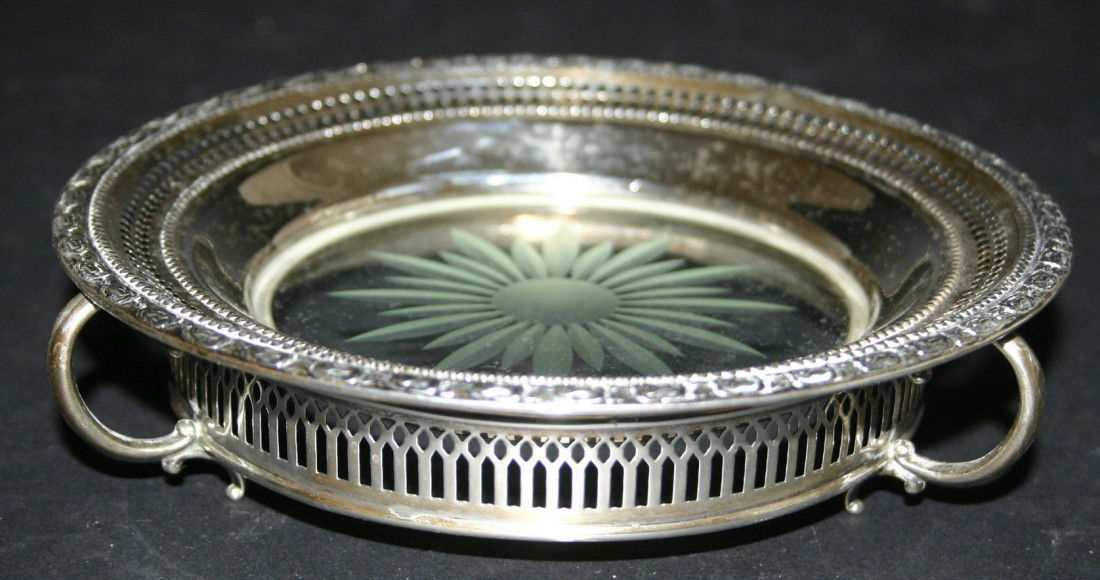 Frank M. Whiting signed sterling Jalisman Pose can: Frank M. Whiting signed sterling Jalisman Pose candy dish with glass bottom. Sterling tray holder with three looped handled. 6 1/2"D. 14.9 grams.