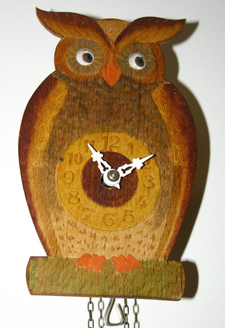 Owl eye movement cuckoo clock. Single pine cone s: Owl eye movement cuckoo clock. Single pine cone style weight.