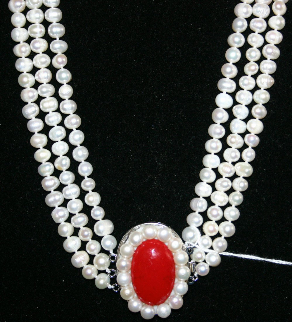 Three-stranded south sea pearl necklace or choker : Three-stranded south sea pearl necklace or choker with pendant. 17" neck.