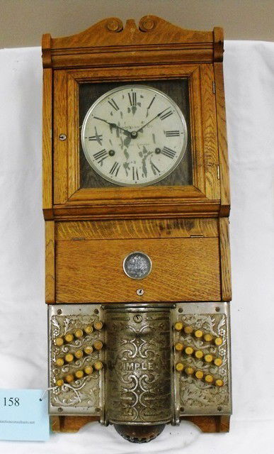 MUNDERLOH AND COMPANY SIMPLEX WALL TIME CLOCK, FAI: MUNDERLOH AND COMPANY SIMPLEX WALL TIME CLOCK, FAIR CONDITION, 14.5 X 34 X 8IN