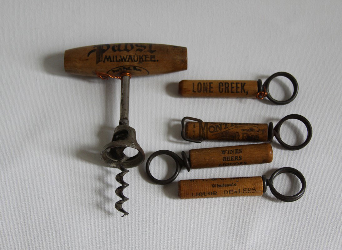 A Lot of 5 Advertising Corkscrews circa 1920's Pab: A Lot of 5 Advertising Corkscrews circa 1920's Pabst, Lone Creek KY, W.T.C. Liquors Evansville In, A. HRDLICKA Cleveland Ohio and Montreal Brand Louisville Ky. Good Condition
