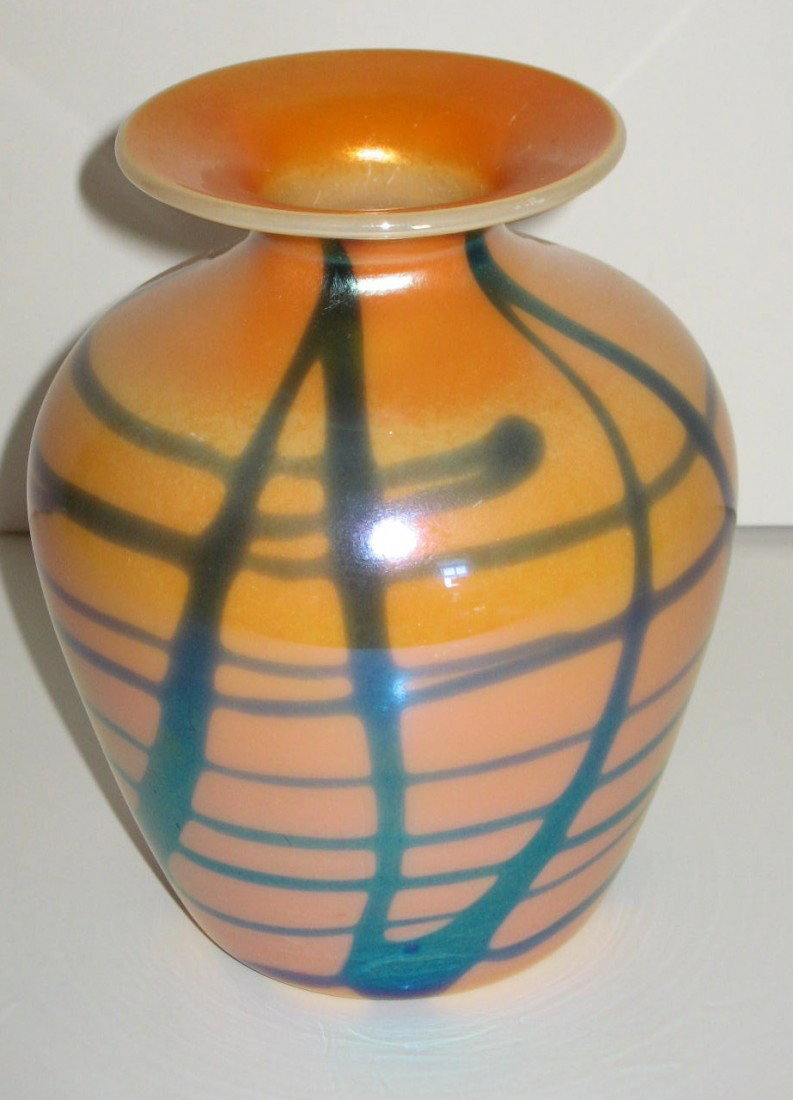 Imperial Free Hand decorated orange vase,: shouldered form in mirror orange decorated with random blue lines, 5 1/2" ht.