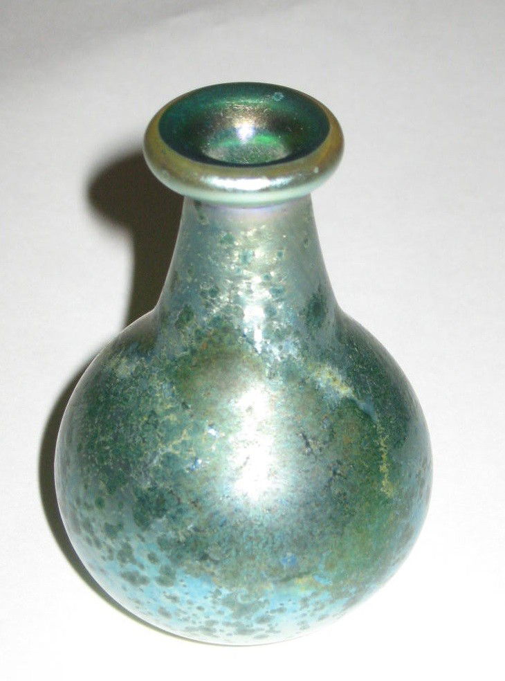 Mark Peiser Art glass vase,: bulbous stick form in green glass decorated with an iridescent blue Cypriot finish, signed Mark Peiser 1974, 3" ht.