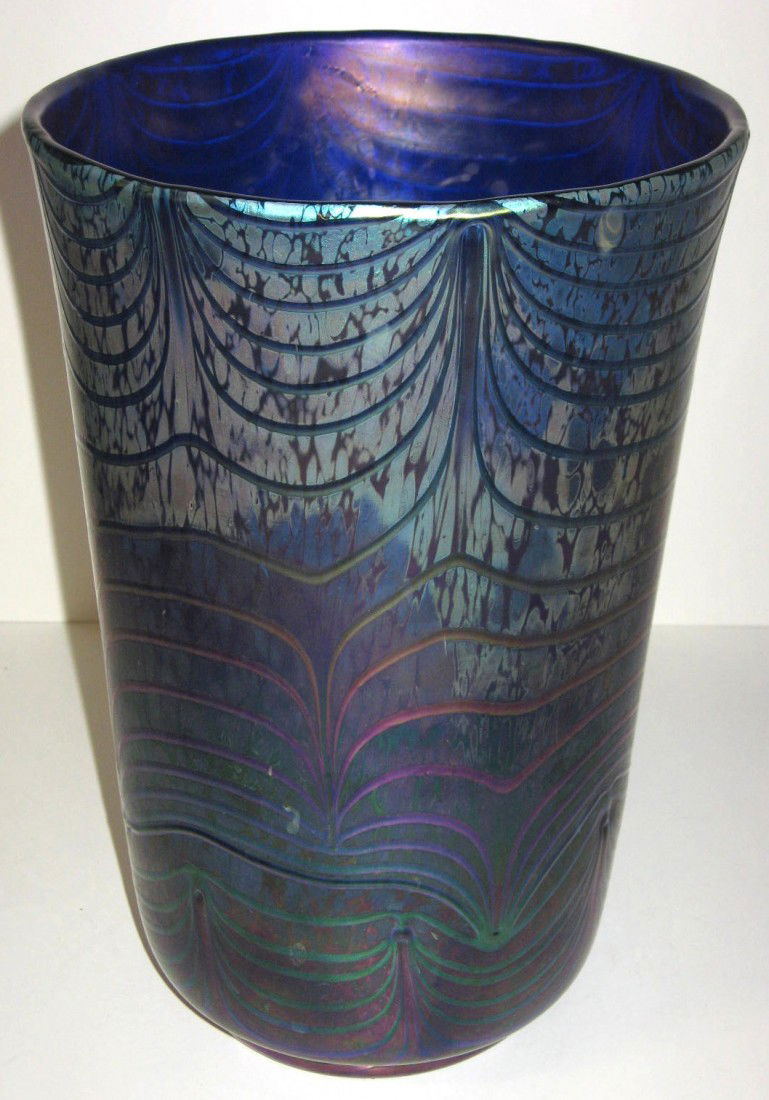 Impressive Loetz iridescent blue vase,: cylindrical bucket form in iridescent blue decorated with a raised pulled feather and featuring an overall oil spot finish, 10 1/2" ht.