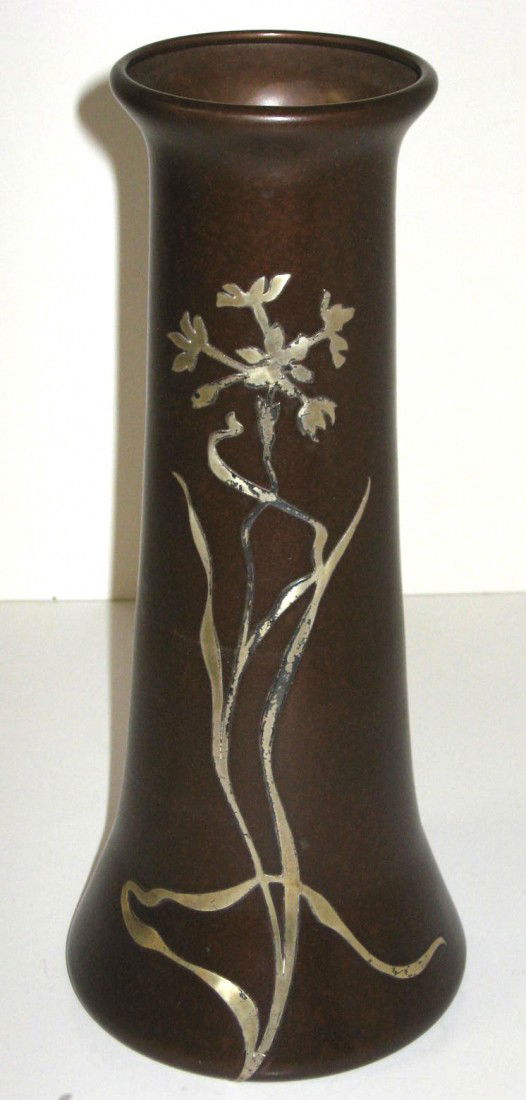 Heinz silver on copper vase,: cylindrical form in copper decorated with a branch of applied silver, engraved on reverse Decoration Tournament Day First Flight 1924 Won by Dr J M Walker, marked with a diamond H back stamp, 10 1/2"