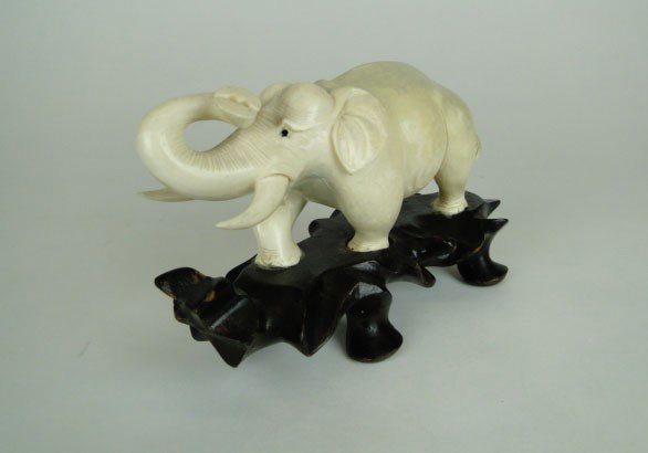 ANTIQUE IVORY ELEPHANT ON STAND: ANTIQUE IVORY ELEPHANT ON STAND Measuring 6 Inches Long, SHIPPING U.S. TO BE $30