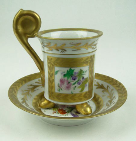 RARE ANTIQUE LIMOGES CUP & SAUCER: RARE ANTIQUE LIMOGES CUP & SAUCER Floral Design & Artist Signed Cup is Three Footed and Measures 4 Inches Tall with Handle Sitting on a 5 Inch Saucer Excellent Condition, SHIPPING U.S. TO BE $20 PLUS 