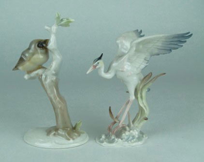 GROUPING OF 2 HUTCHENREUTHER BIRD FIGURINES: GROUPING OF 2 HUTCHENREUTHER BIRD FIGURINES first being a 5 1/2" crane, and the other a 6 1/2" sparrow, both in very good condition, SHIPPING U.S TO BE $25 PLUS INS